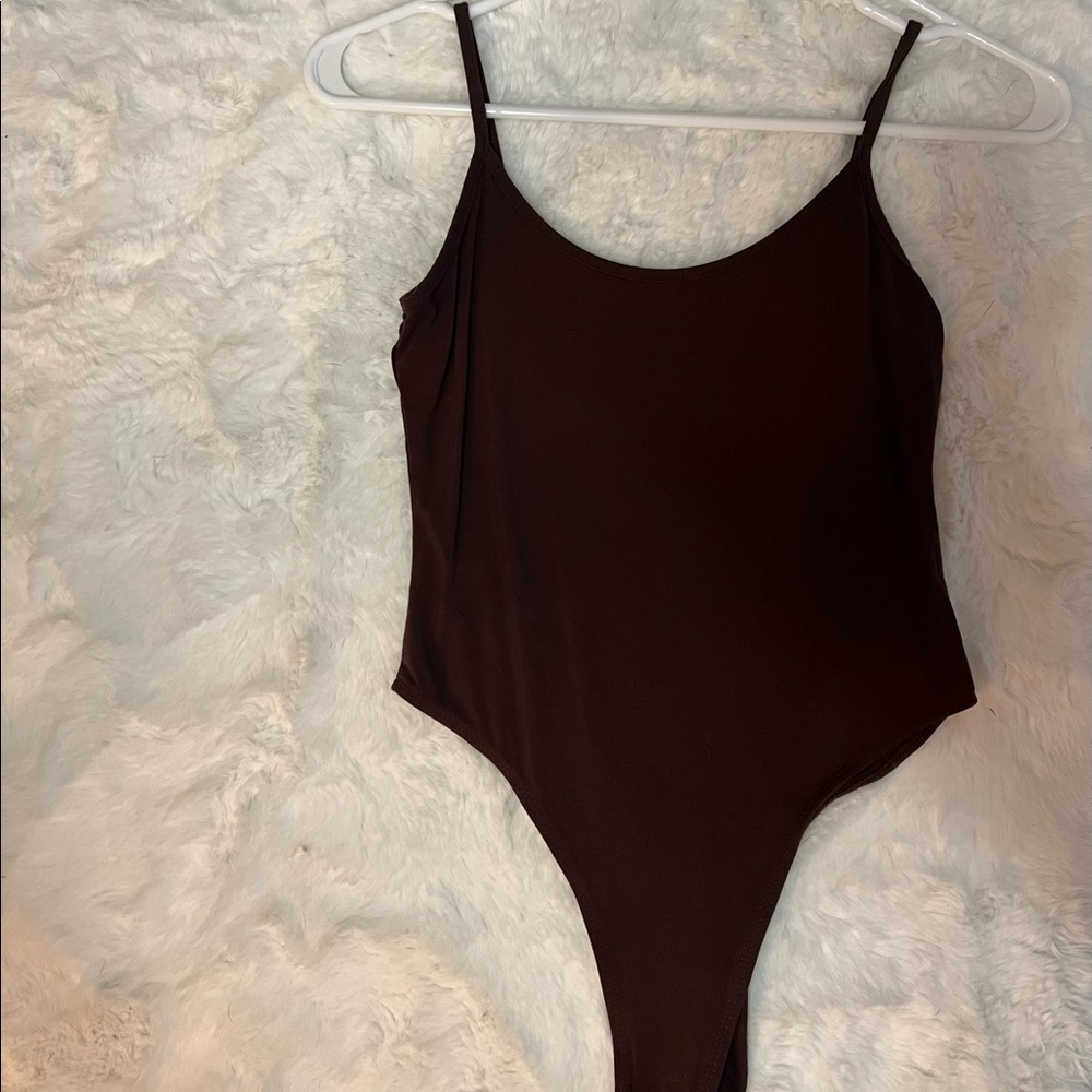 Never worn body suit